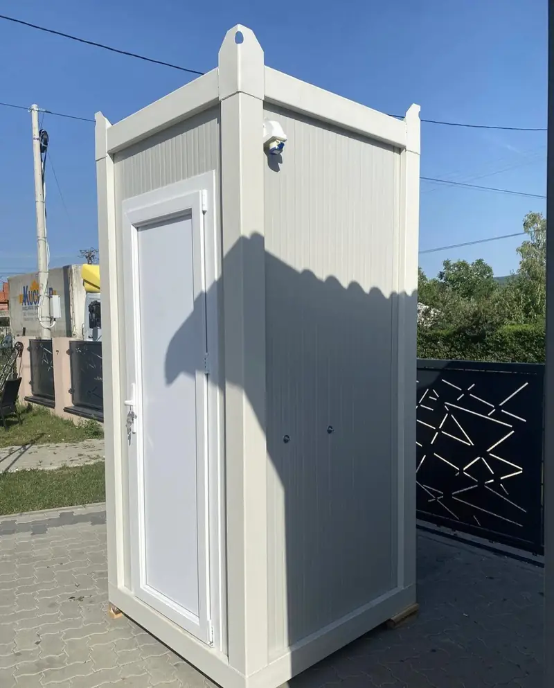 Side view of a white VIP luxury restroom unit